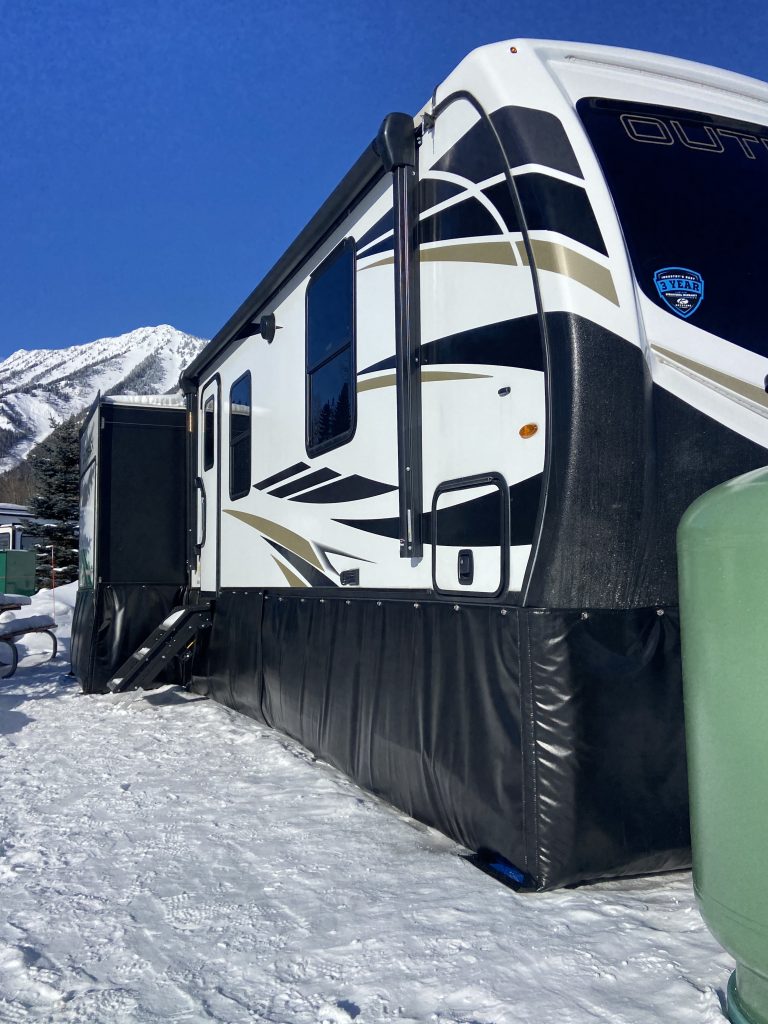 side view rv skirt in winter insulation